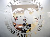 
	Criza datoriilor din zona euro trage in jos economia mondiala. FMI reduce estimarile de crestere
