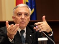 
	Isarescu, intrebat despre trecerea la moneda euro in 2015: "Sa depasim mai intai alegerile. Daca nu suntem pregatiti, avem destul timp sa schimbam termenul"
