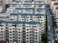 
	Culmea crizei la chinezi: cine cumpara un apartament primeste un BMW gratis
