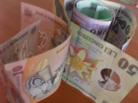 
	Leul s-a apreciat la deschiderea sesiunii. Cursul a coborat spre 4,33 lei/euro
