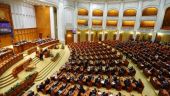 
	1000 de lei amenda daca NU te prezinti la vot. Legea a fost adoptata tacit de Senat
